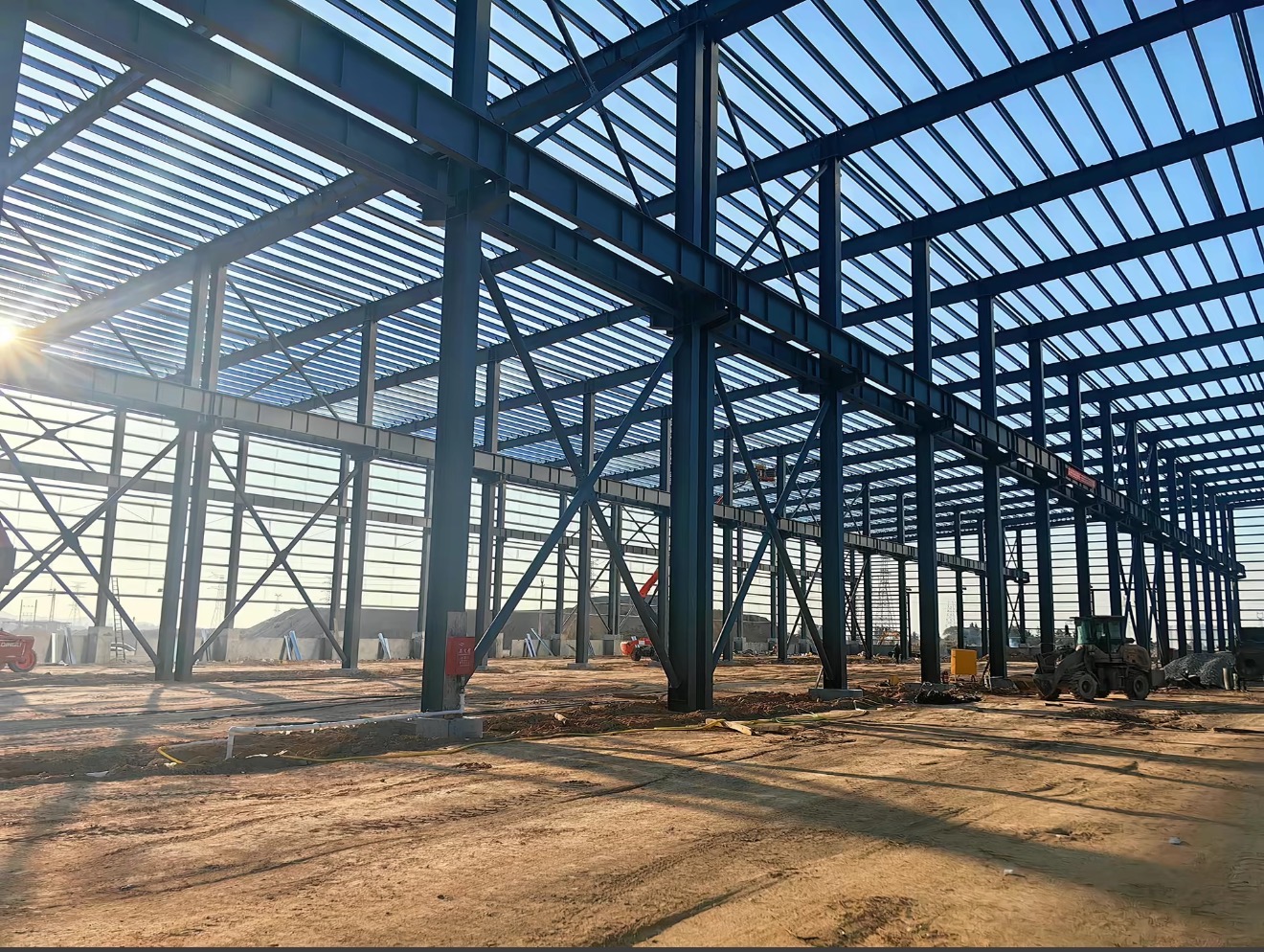 Industrial workshop steel frame under site construction for Korea steel structure buyers