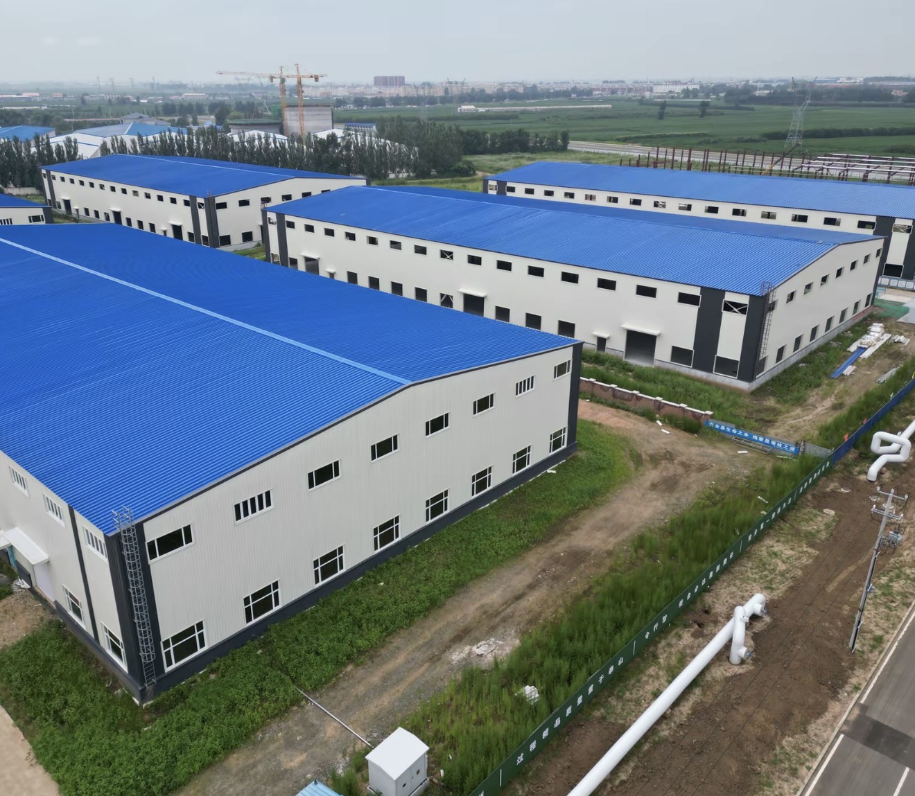 Korea completed factory steel buildings with blue roof panels and exterior wall cladding