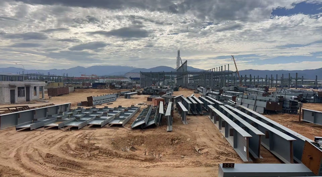 Malaysia steel structure members staged on site for warehouse installation sequence