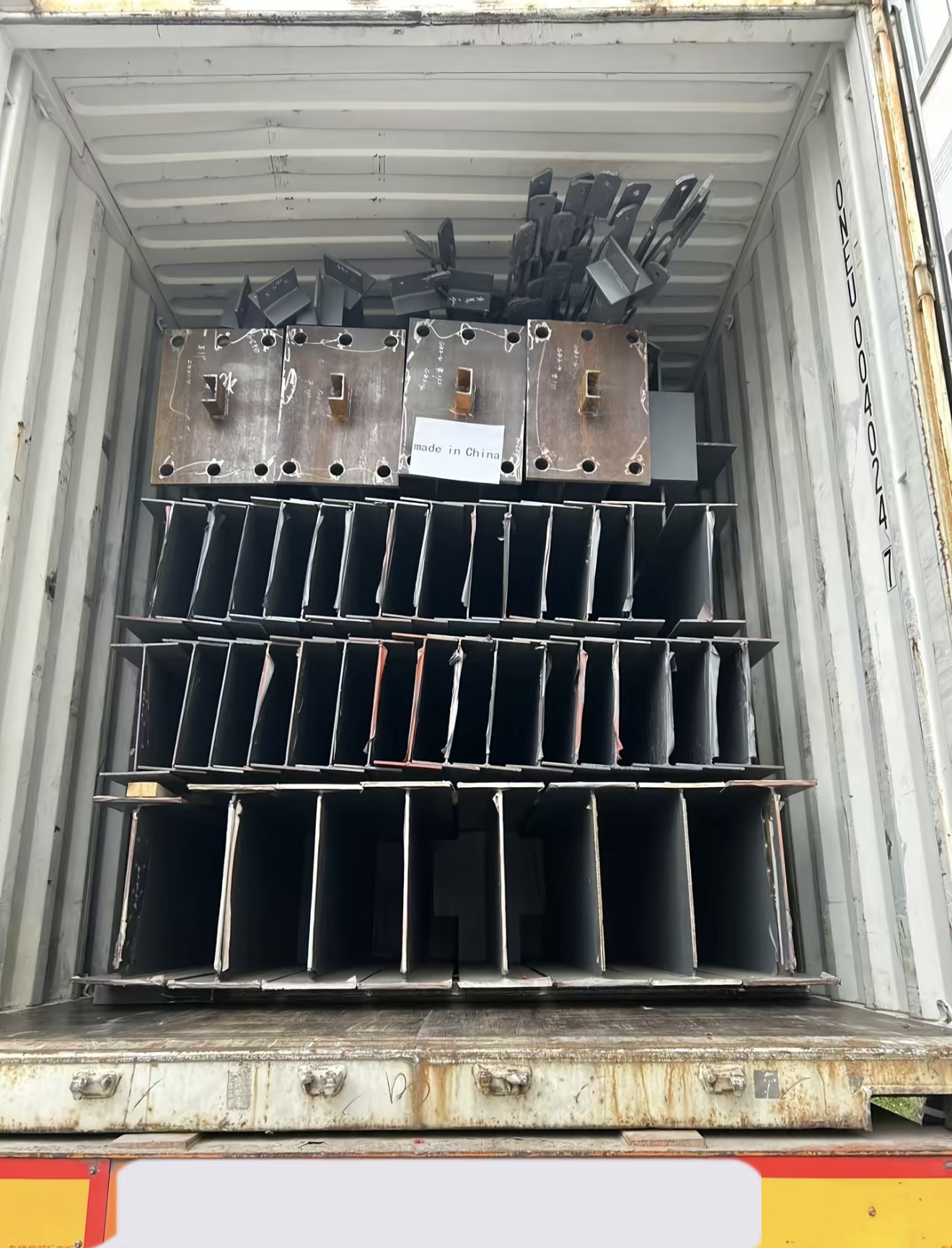 Packed steel members prepared for site receiving checklist review in a Saudi Arabia project