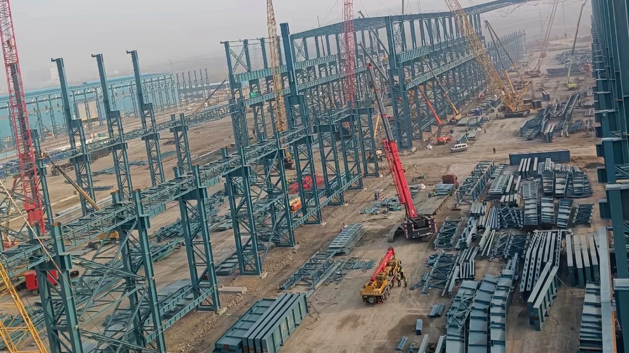 Industrial steel members organized on site for delivery document and receiving review